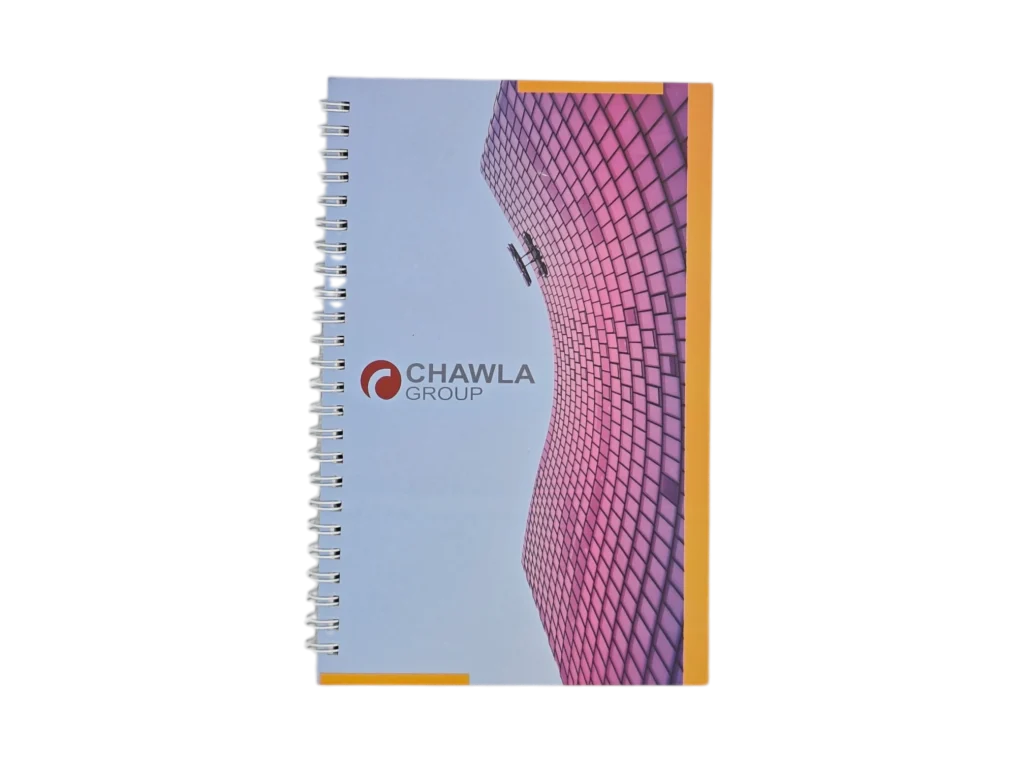 Custom branded spiral notebook with architectural print for Chawla Group corporate gifting