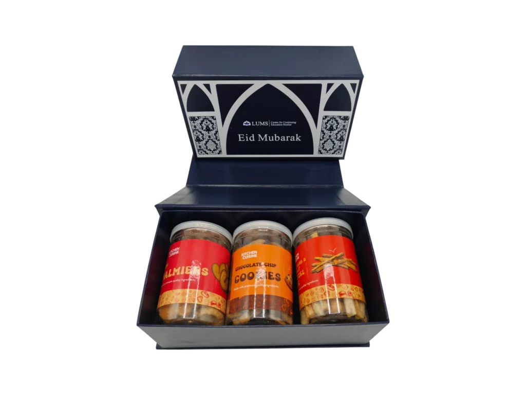Eid Mubarak corporate gift box with three jars of cookies and snacks in navy blue packaging