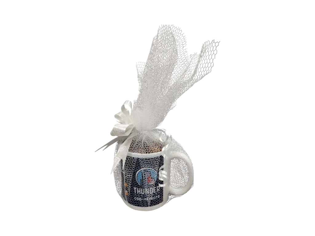 Branded corporate ceramic mug wrapped in white tulle as a ready gift