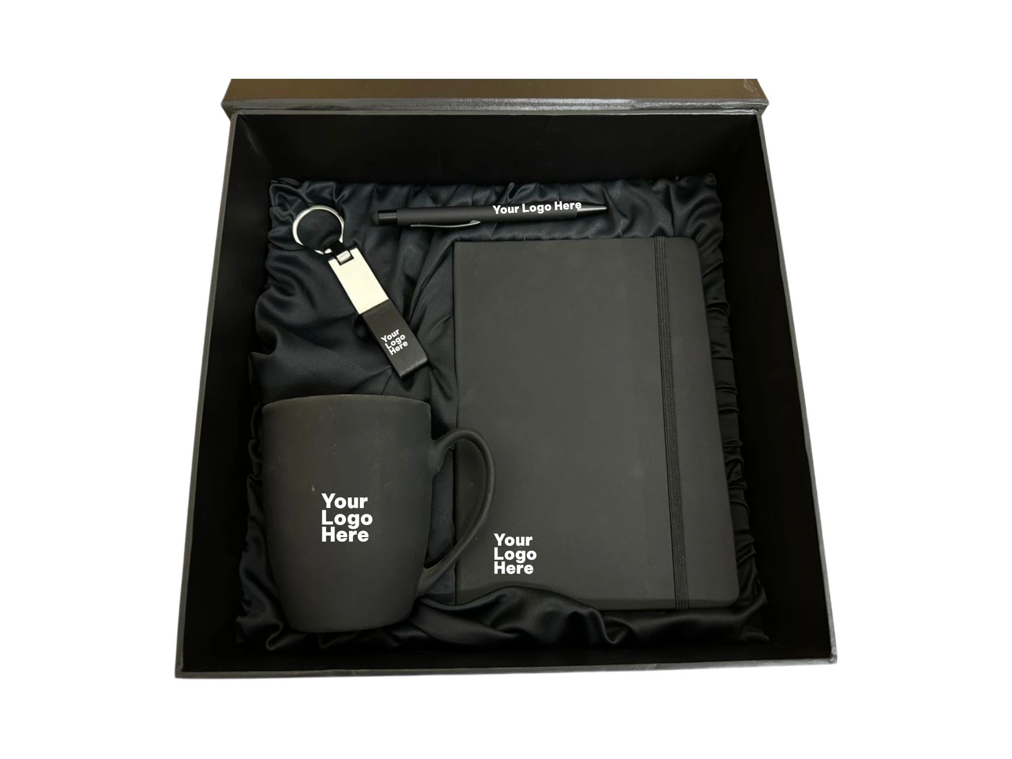 All black corporate gift set with mug, notebook, pen and keychain in black satin box
