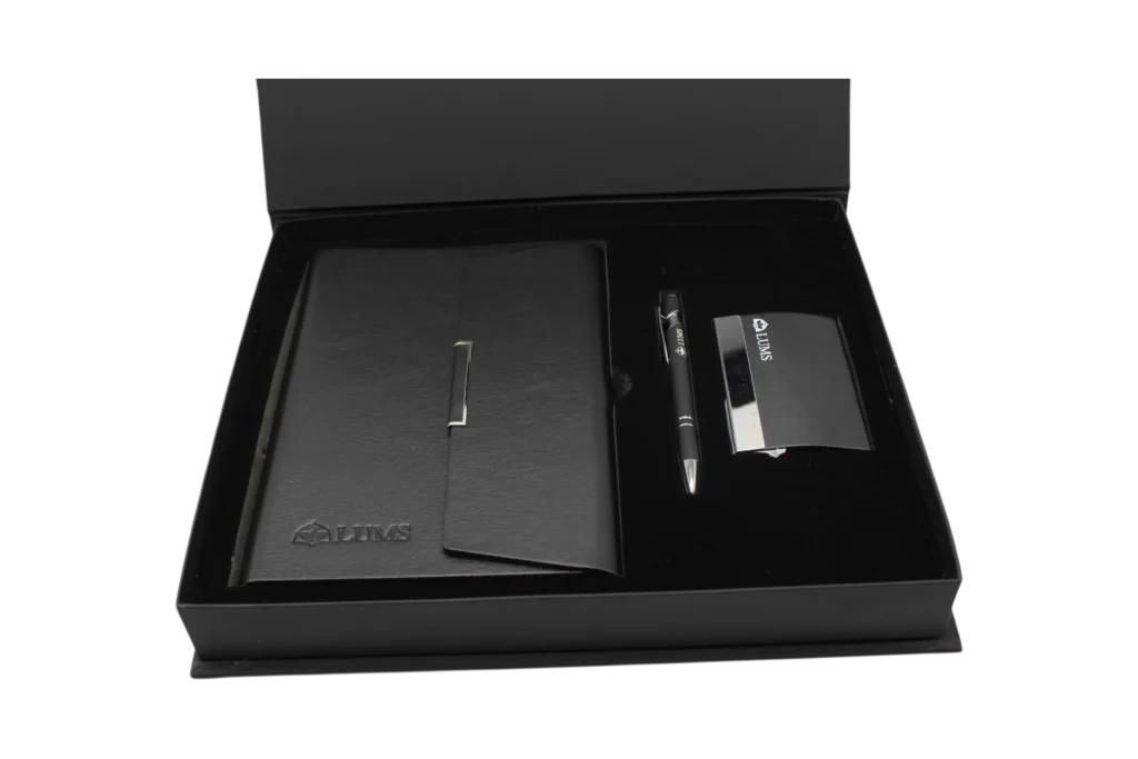 Black leather corporate gift set with notebook, pen and metal card holder in black box