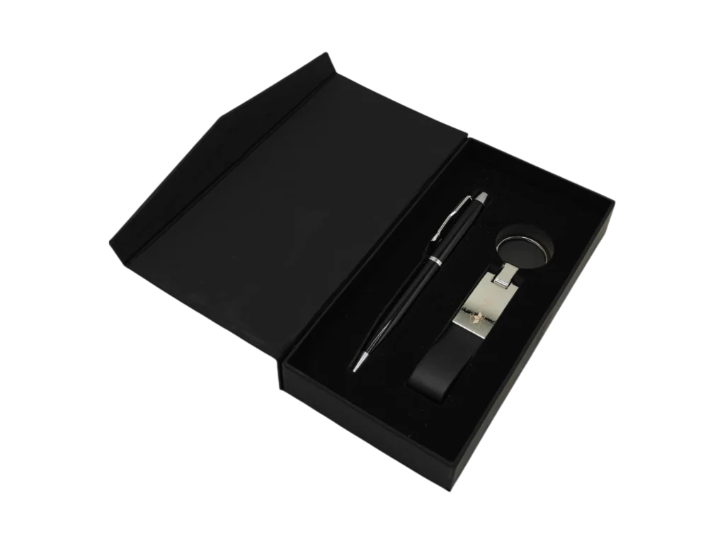 Black corporate gift set with metal pen and leather keychain in black magnetic box